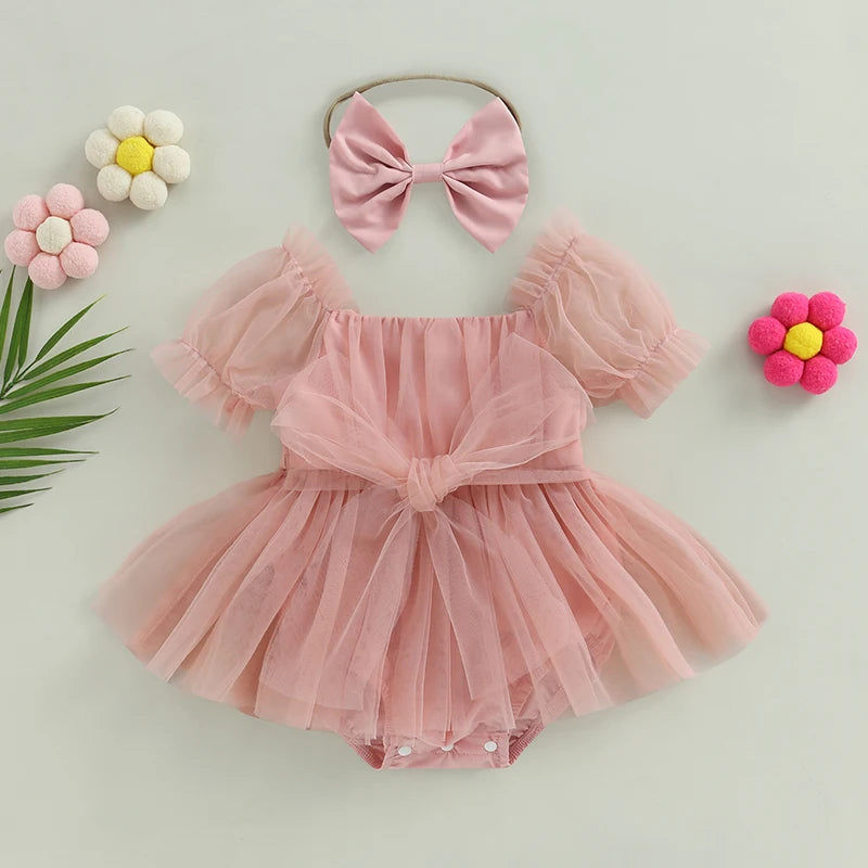Elegance in Pink Tulle The Baptism Dress of Your Dreams.