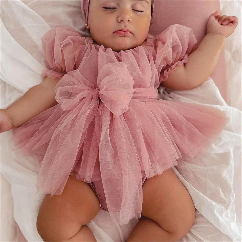 Elegance in Pink Tulle The Baptism Dress of Your Dreams.